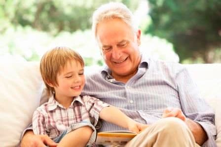 World Hearing Day 2019 | Soundwave Hearing Care grandfather reading with grandson