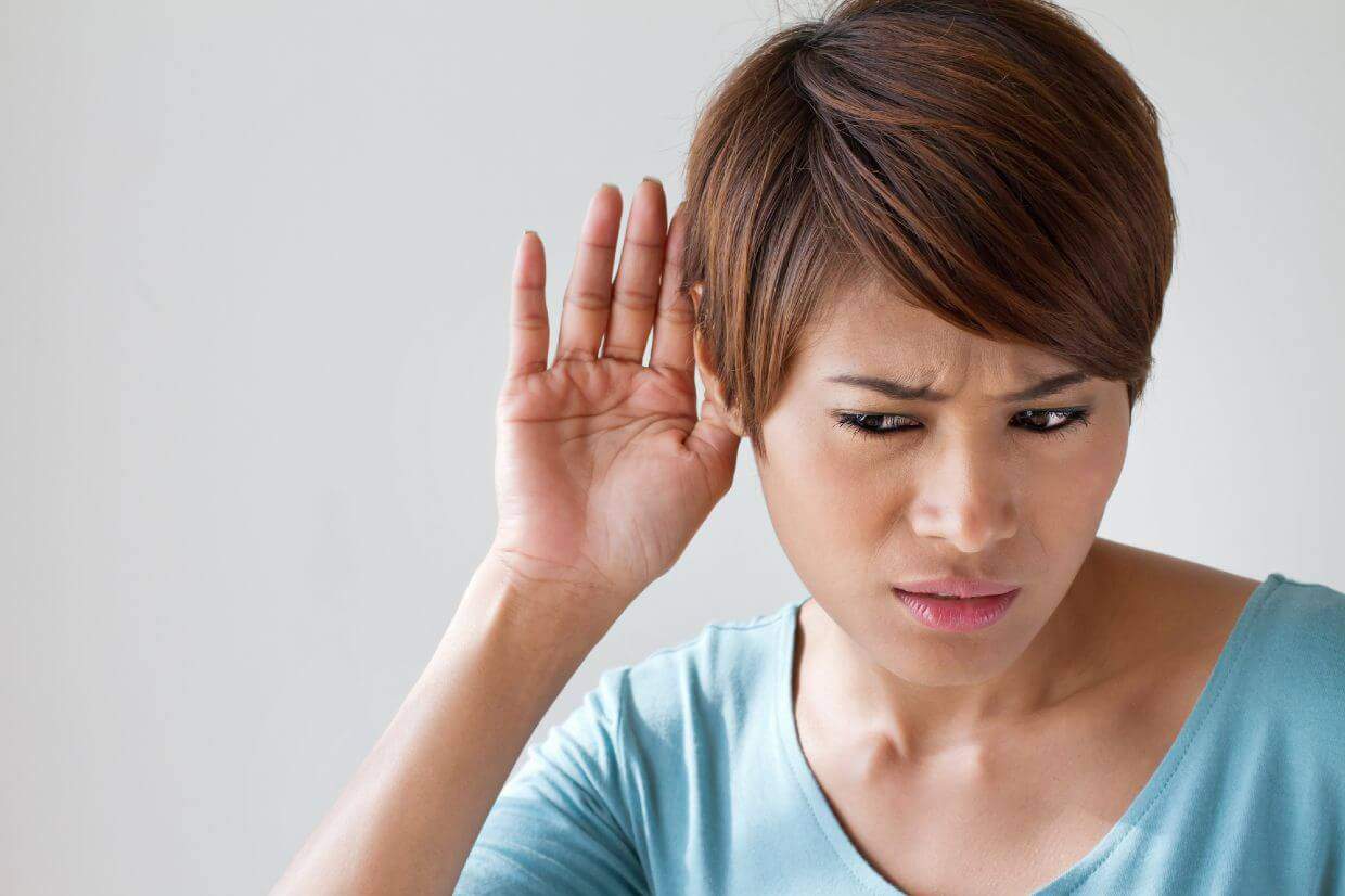 Woman with hearing difficulty