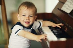 toddler on the piano