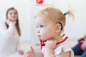 toddler at an audiologist test