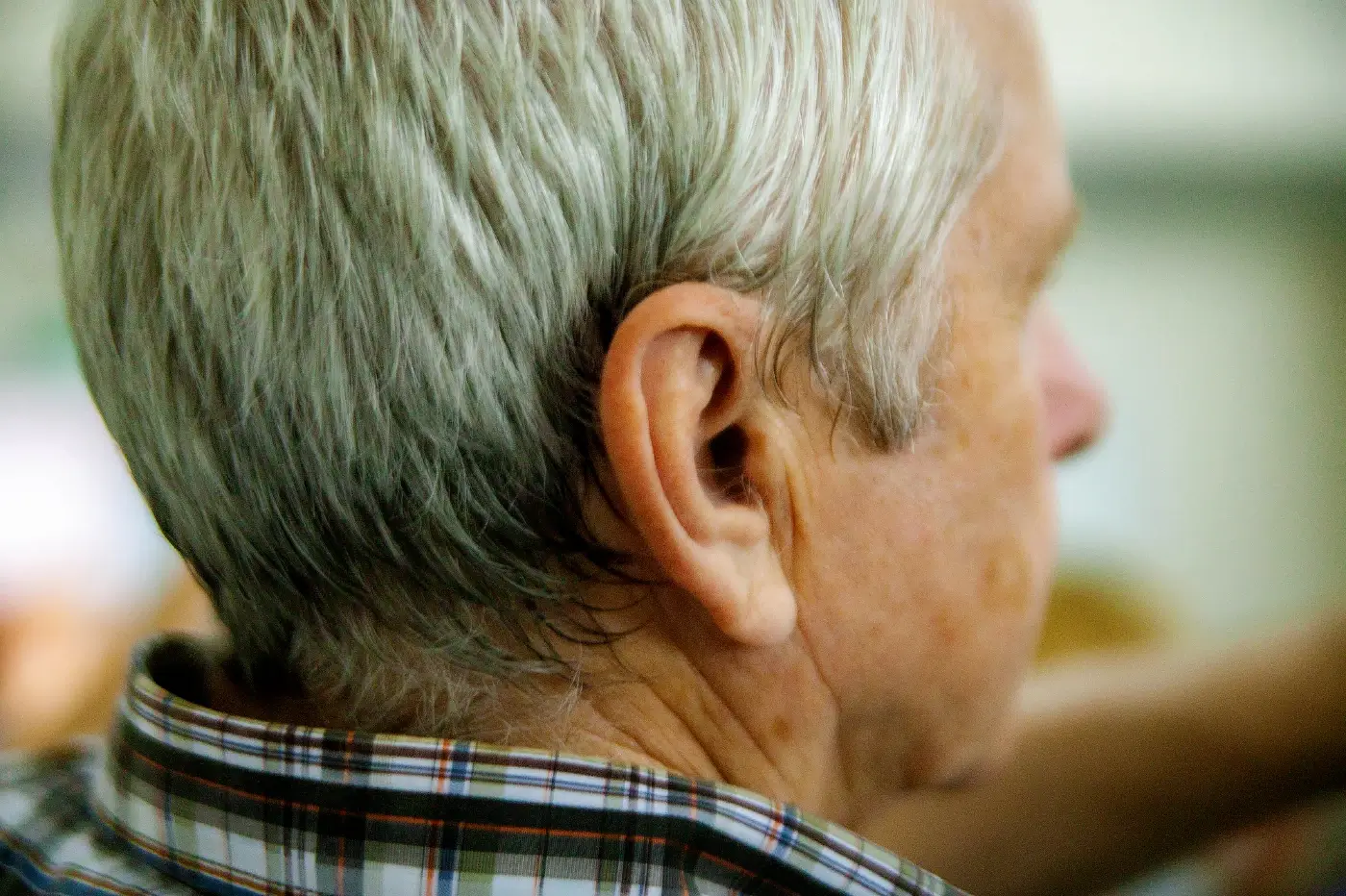 hearing-impairment-prevalnce Blurred head of older gentlemen from the side.