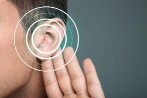 Young man with symptom of hearing loss