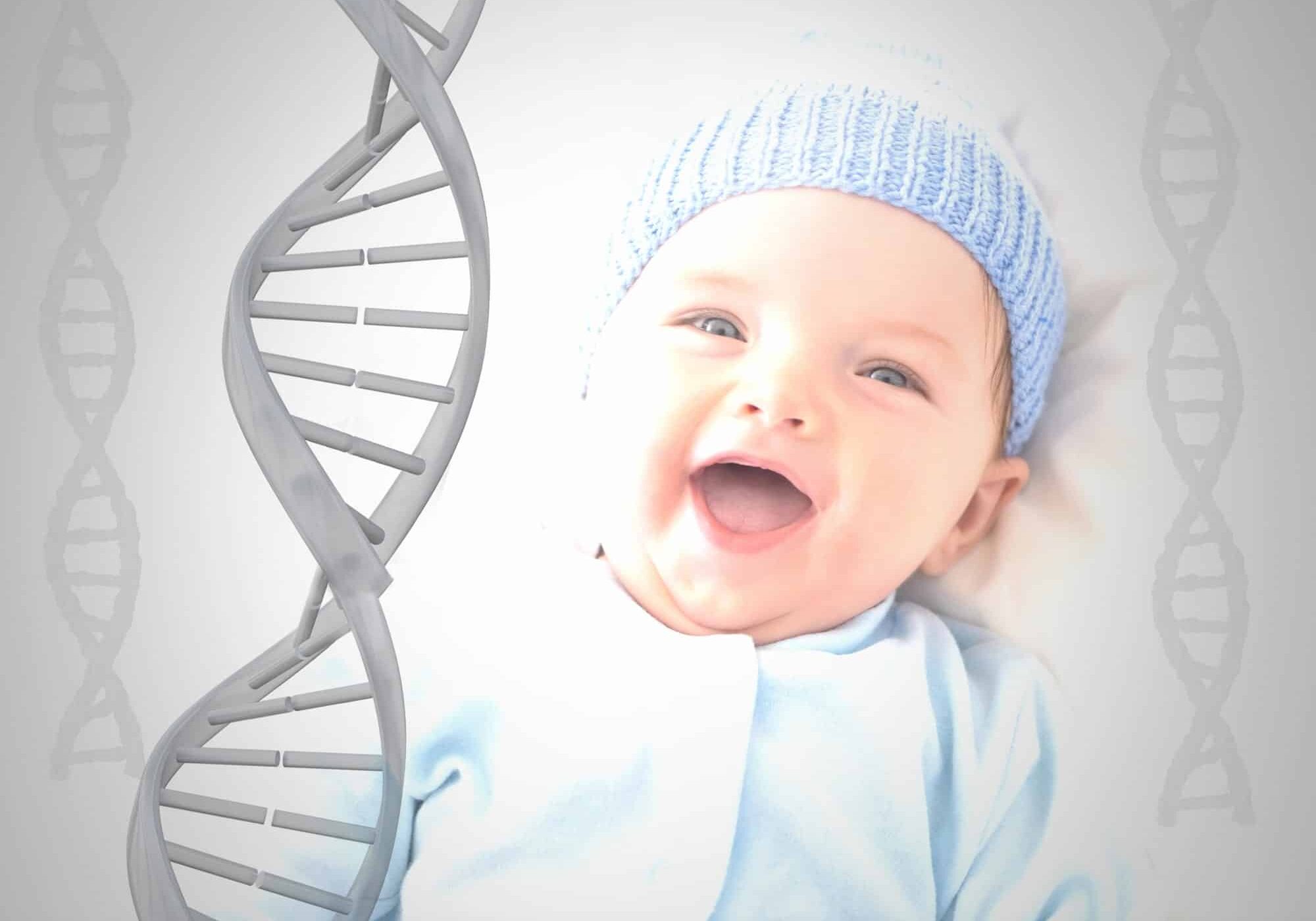 Smiling baby next to DNA