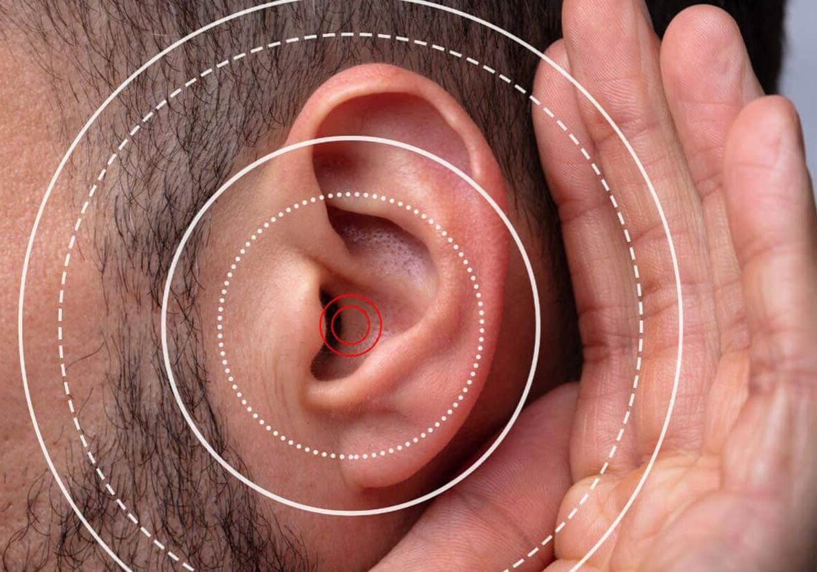 Image of a man zoomed in on his ear with ripples coming out of it