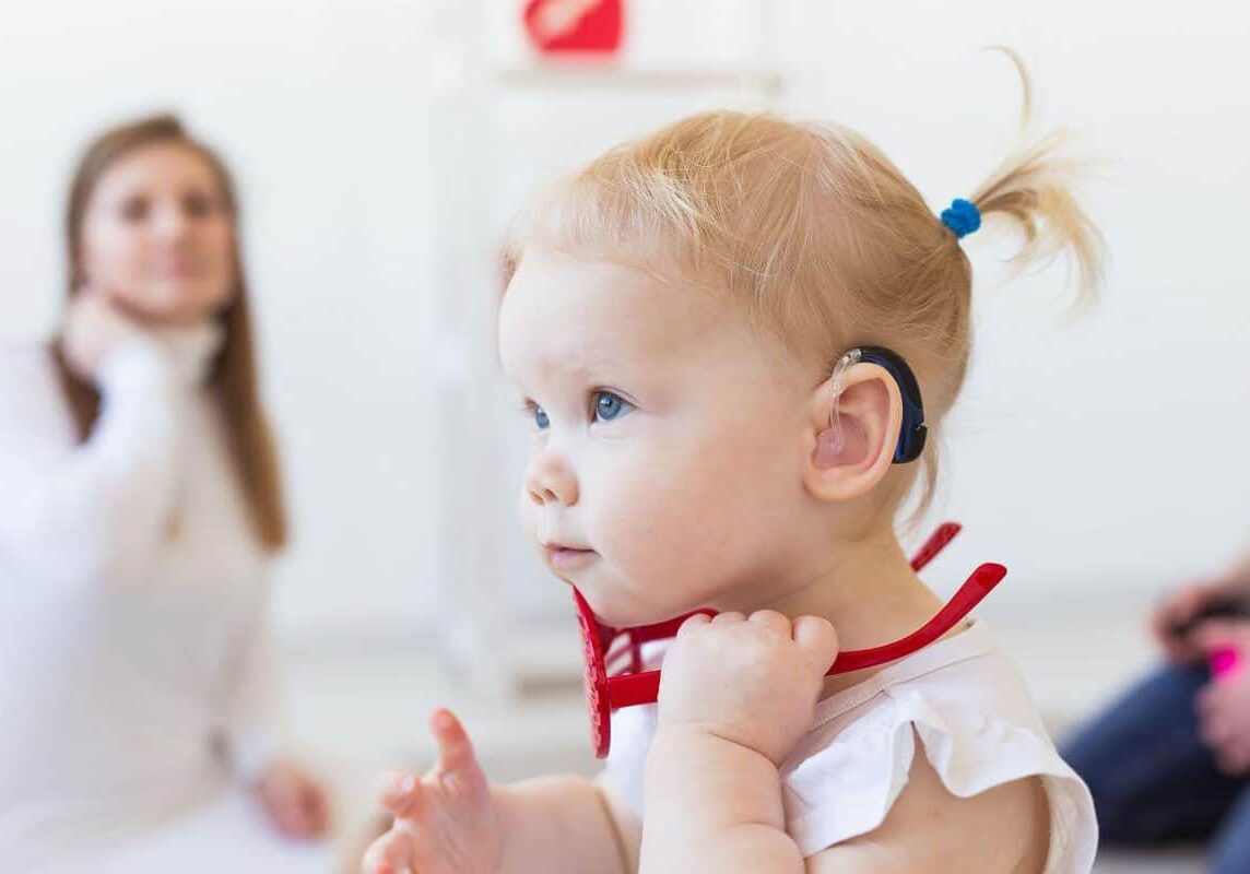 toddler at an audiologist test